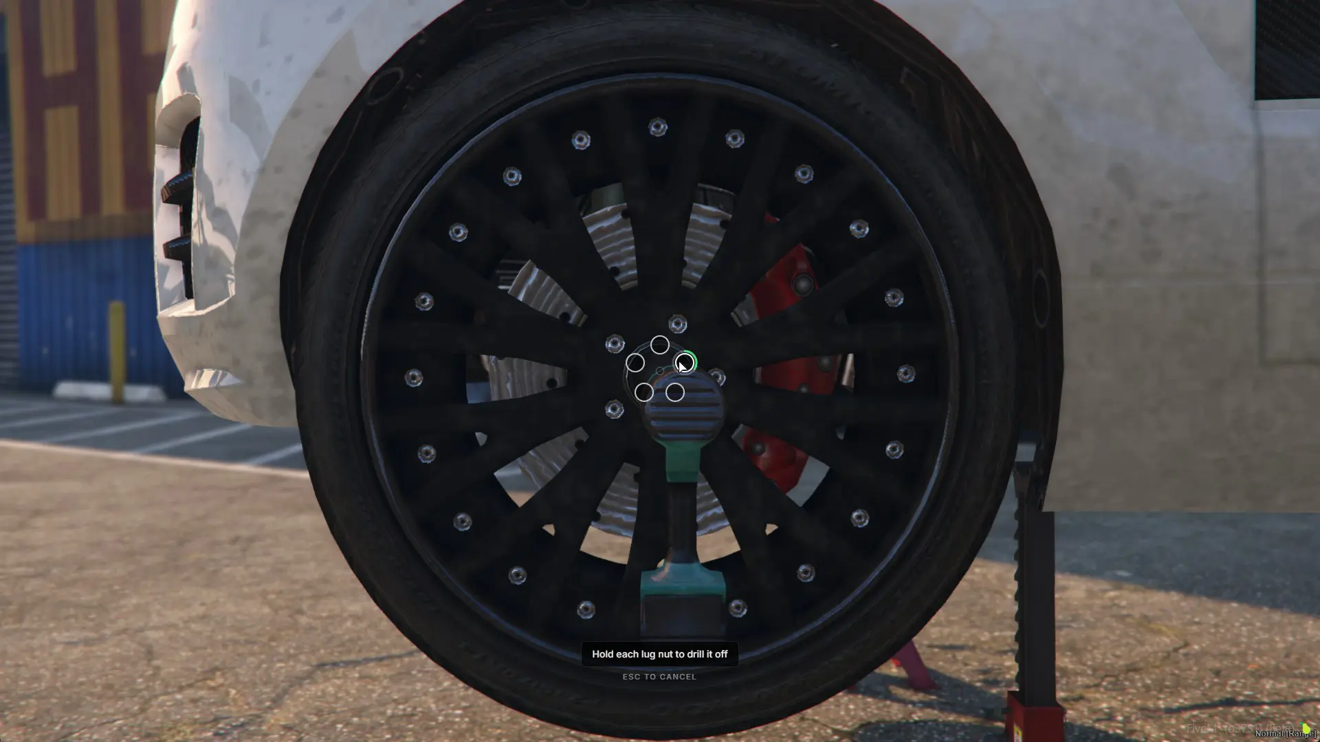 The wheel minigame - five lug nuts around the hub, the drill held on one and the ring filling